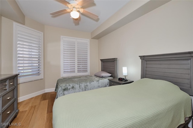 bedroom featuring ceiling fan and light hardwood / wood-style floors