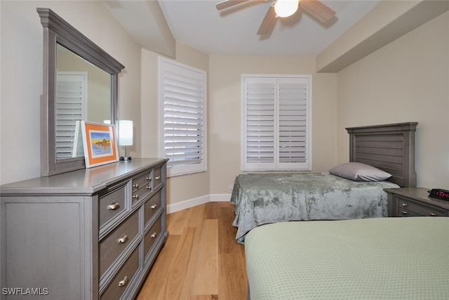 bedroom featuring ceiling fan and light wood-type flooring