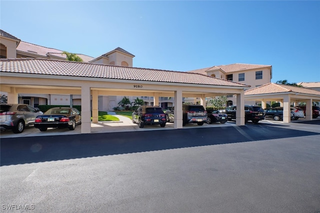 view of car parking featuring a carport