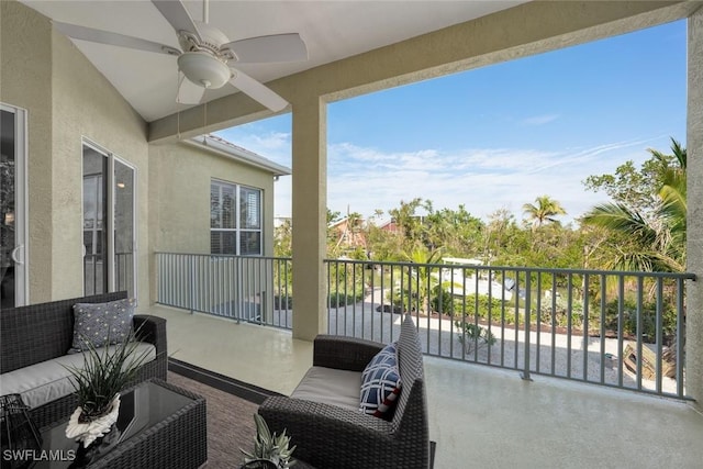 balcony featuring an outdoor hangout area and ceiling fan