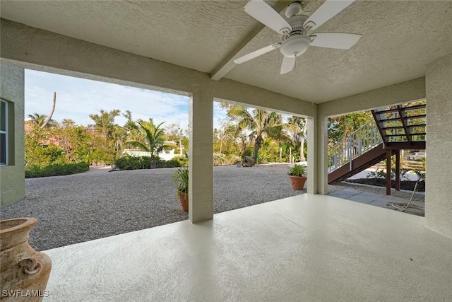 view of patio / terrace featuring ceiling fan