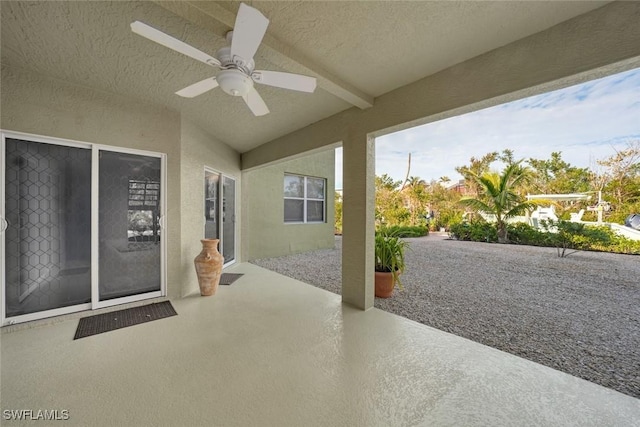 view of patio / terrace featuring ceiling fan