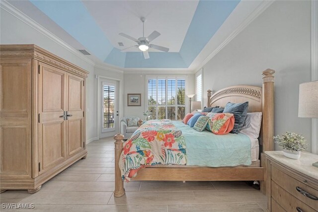 bedroom with access to outside, ornamental molding, a raised ceiling, ceiling fan, and light hardwood / wood-style floors