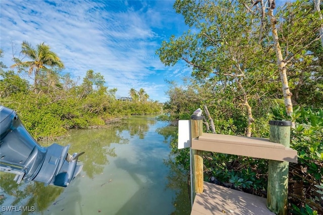 view of dock with a water view