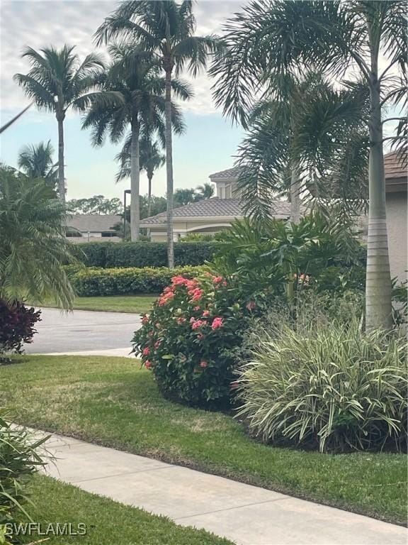 8580 Cedar Hammock Cir Unit 714, Naples, FL 34112 - view of community featuring a lawn