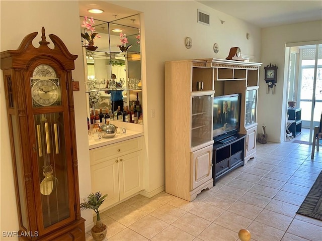 kitchen with visible vents, light countertops, and light tile patterned flooring