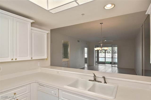 8580 Cedar Hammock Cir Unit 714, Naples, FL 34112 - kitchen featuring dishwasher, a chandelier, white cabinets, light countertops, and recessed lighting
