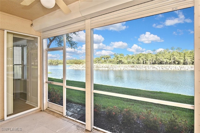 8580 Cedar Hammock Cir Unit 714, Naples, FL 34112 - unfurnished sunroom featuring a water view and a ceiling fan