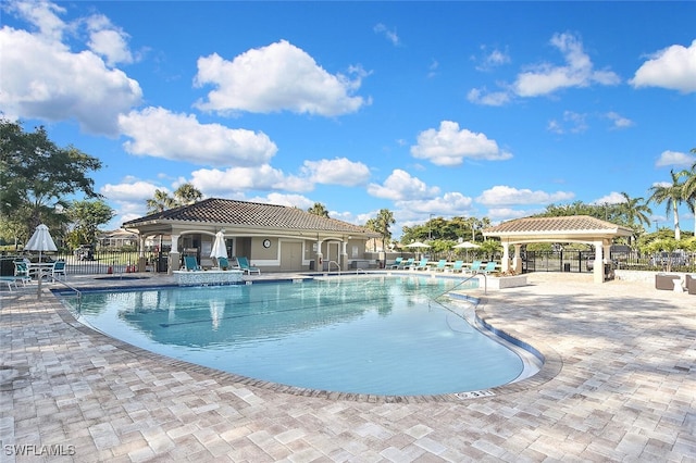 8580 Cedar Hammock Cir Unit 714, Naples, FL 34112 - community pool featuring a gazebo and a patio area