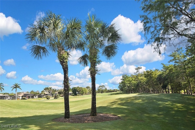 8580 Cedar Hammock Cir Unit 714, Naples, FL 34112 - view of property's community with view of golf course and a lawn