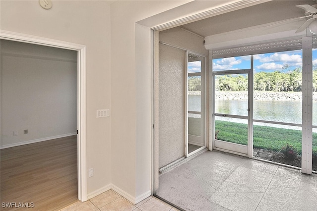 8580 Cedar Hammock Cir Unit 714, Naples, FL 34112 - unfurnished sunroom featuring a water view