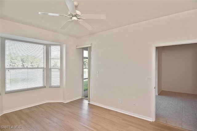 8580 Cedar Hammock Cir Unit 714, Naples, FL 34112 - spare room featuring light wood finished floors and a ceiling fan