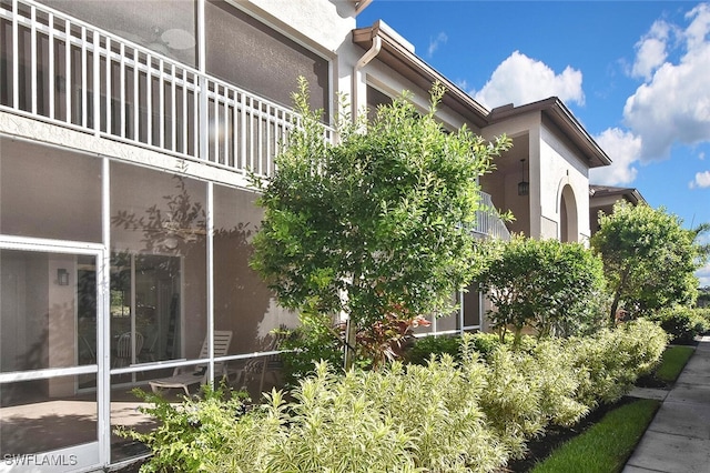 8580 Cedar Hammock Cir Unit 714, Naples, FL 34112 - view of side of home featuring stucco siding