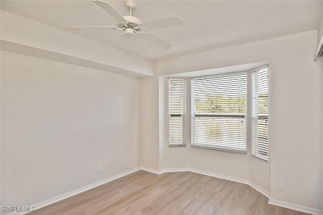 8580 Cedar Hammock Cir Unit 714, Naples, FL 34112 - unfurnished room with light wood-style flooring and ceiling fan