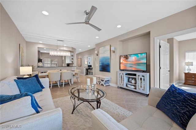 tiled living room featuring ceiling fan