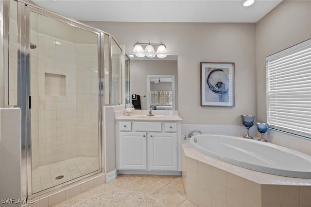 bathroom with vanity, separate shower and tub, and tile patterned flooring