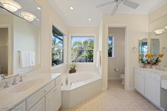 bathroom featuring a bathing tub, tile patterned flooring, vanity, toilet, and crown molding