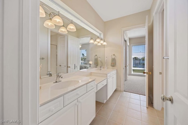 bathroom with vanity and tile patterned floors