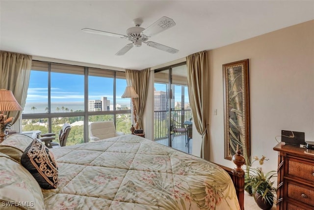 carpeted bedroom with access to exterior and ceiling fan