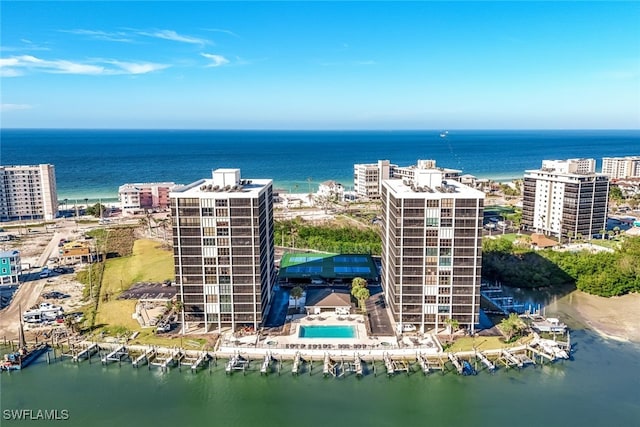 birds eye view of property featuring a water view