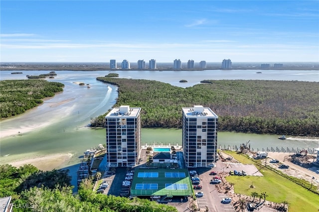 birds eye view of property with a water view