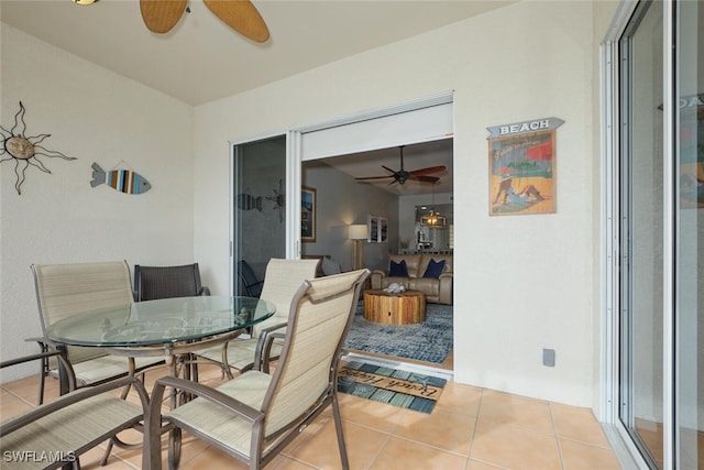 interior space featuring ceiling fan