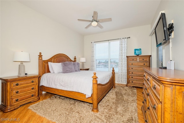 bedroom featuring ceiling fan and hardwood / wood-style flooring