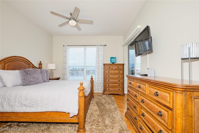 bedroom with light wood-type flooring and ceiling fan