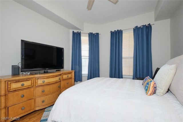 bedroom featuring ceiling fan and light wood-type flooring