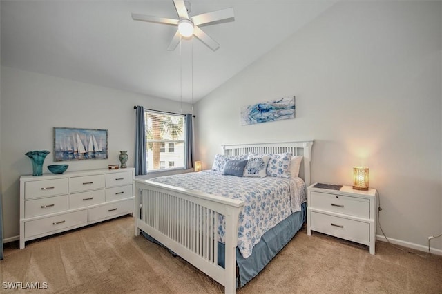 carpeted bedroom featuring ceiling fan and vaulted ceiling