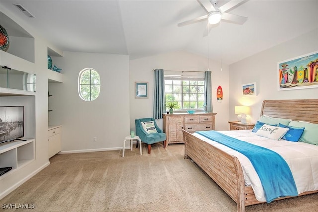 bedroom with ceiling fan, light carpet, and vaulted ceiling