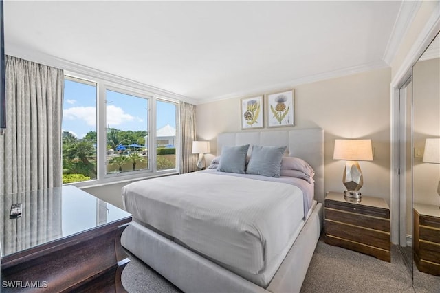 carpeted bedroom with crown molding