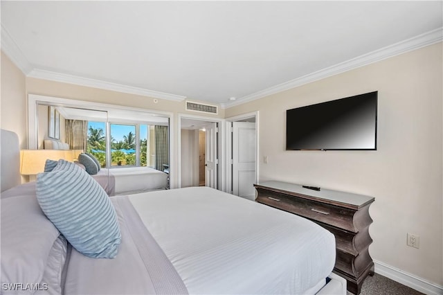 bedroom with carpet and ornamental molding