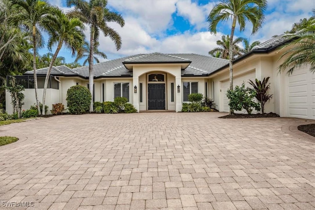 view of front of home with a garage