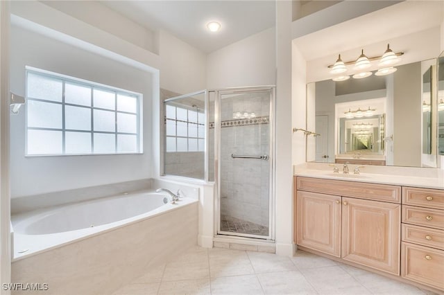 bathroom featuring vanity, tile patterned flooring, lofted ceiling, and independent shower and bath