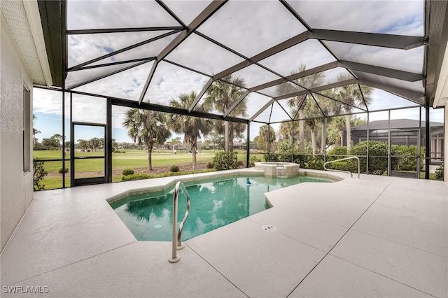 view of swimming pool with an in ground hot tub, a patio area, and glass enclosure