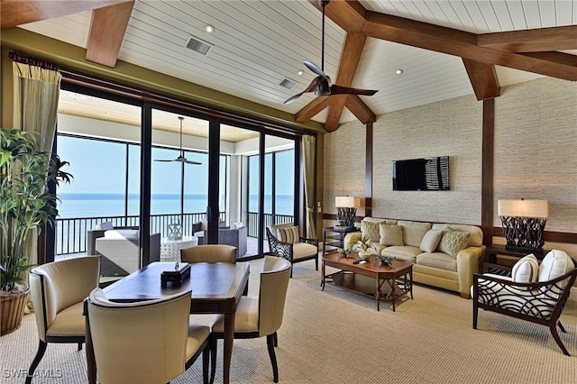 interior space featuring ceiling fan, a water view, wood ceiling, and beam ceiling