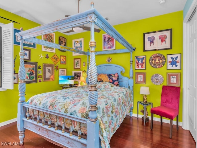 bedroom with a closet and wood-type flooring