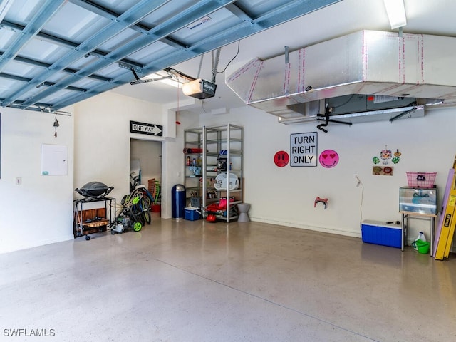 garage featuring a garage door opener