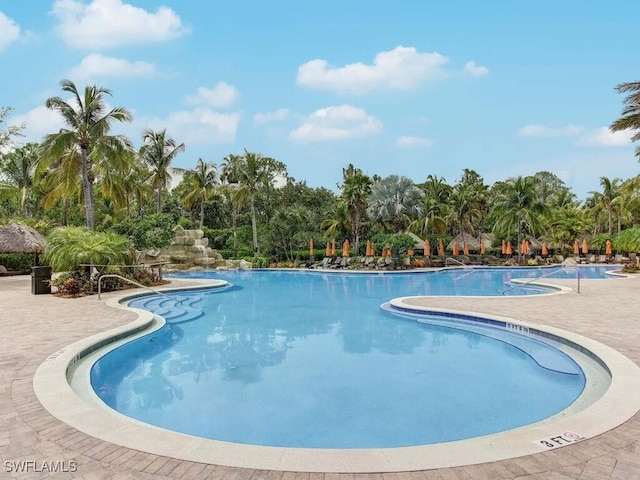 view of swimming pool featuring a patio area