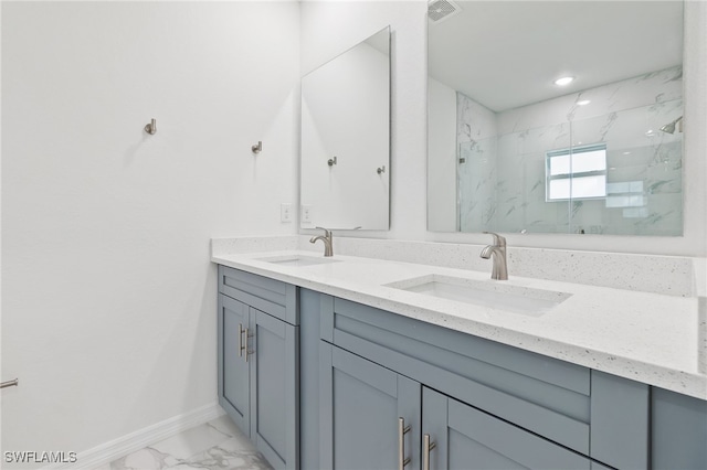 bathroom featuring walk in shower and vanity