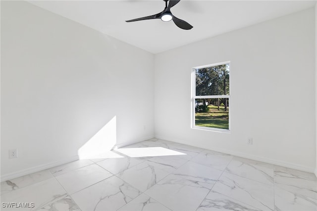 unfurnished room with ceiling fan