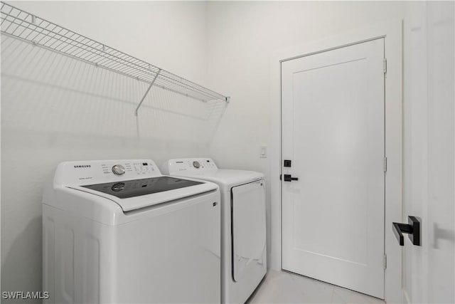 laundry room featuring washer and dryer