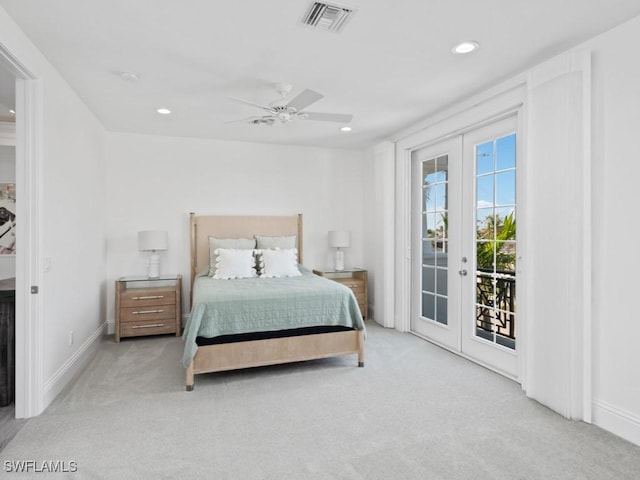 bedroom featuring access to exterior, french doors, ceiling fan, and light colored carpet