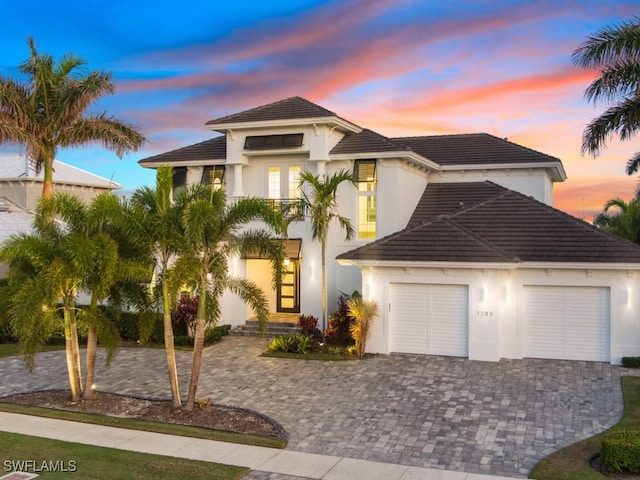 1285 Martinique Ct, Marco Island, FL 34145 - mediterranean / spanish-style house with a garage