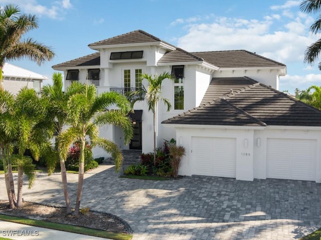 mediterranean / spanish-style house featuring a garage