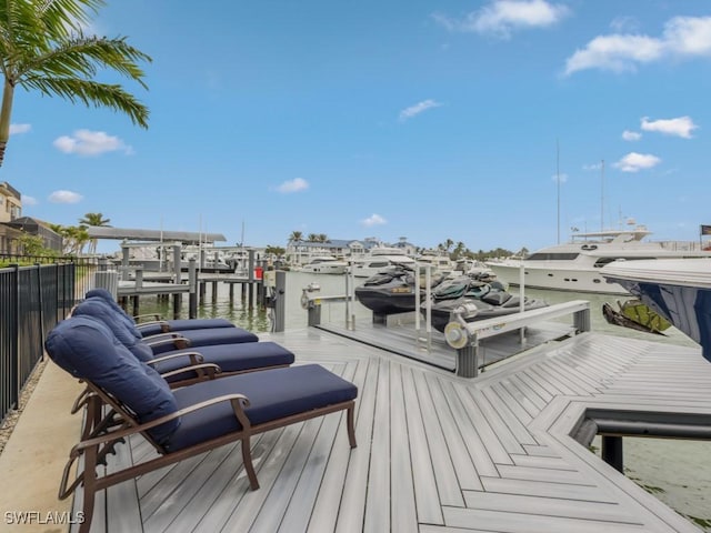 dock area with a water view