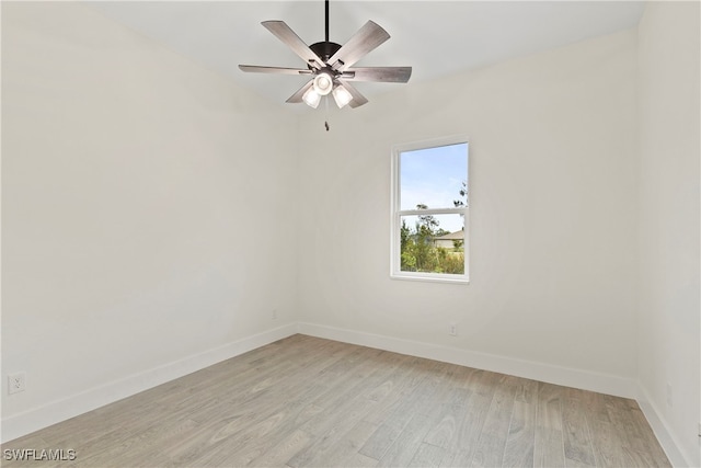 empty room featuring ceiling fan and light hardwood / wood-style flooring