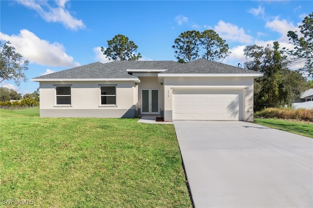 single story home with a garage, driveway, french doors, a front yard, and stucco siding