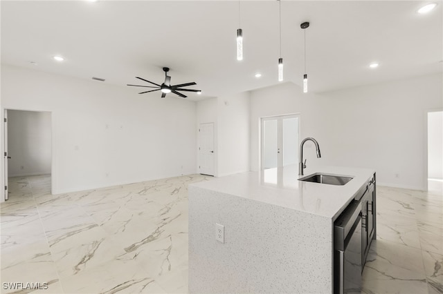 kitchen featuring a center island with sink, open floor plan, marble finish floor, pendant lighting, and a sink